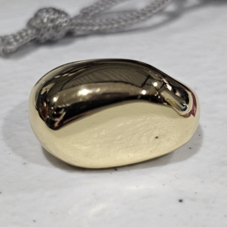 $35 Bellezza free form dome ring sz 5 New This Bellezza free form dome ring features a striking design with a smooth, polished surface that reflects light beautifully. Crafted in a rich gold tone, the ring showcases an organic, asymmetrical shape that pr