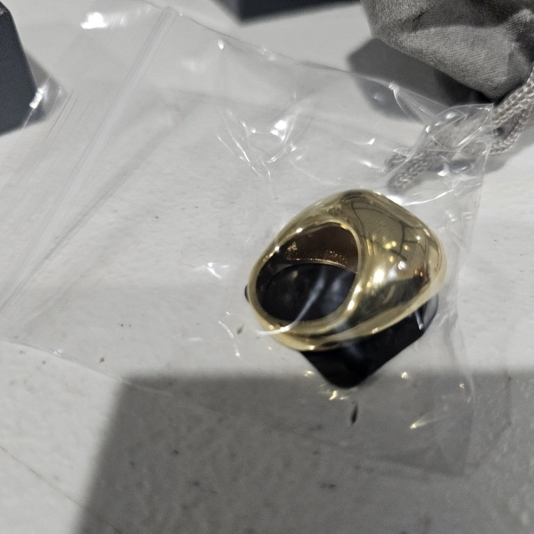 $35 Bellezza free form dome ring sz 5 New This Bellezza free form dome ring features a striking design with a smooth, polished surface that reflects light beautifully. Crafted in a rich gold tone, the ring showcases an organic, asymmetrical shape that pr