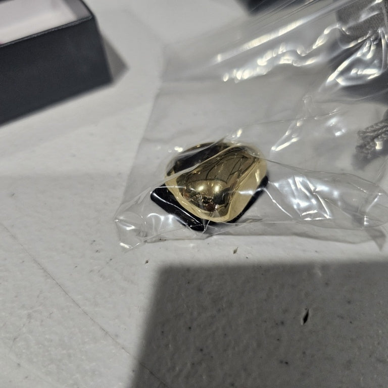 $35 Bellezza free form dome ring sz 5 New This Bellezza free form dome ring features a striking design with a smooth, polished surface that reflects light beautifully. Crafted in a rich gold tone, the ring showcases an organic, asymmetrical shape that pr