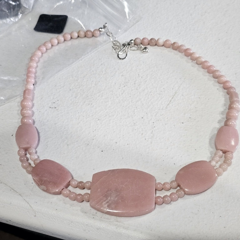 $143 Jay king strawberry quartz necklace New This exquisite Jay King strawberry quartz necklace features a stunning design with a combination of larger polished stones and delicate beading. The soft pink hues of the strawberry quartz create a serene and