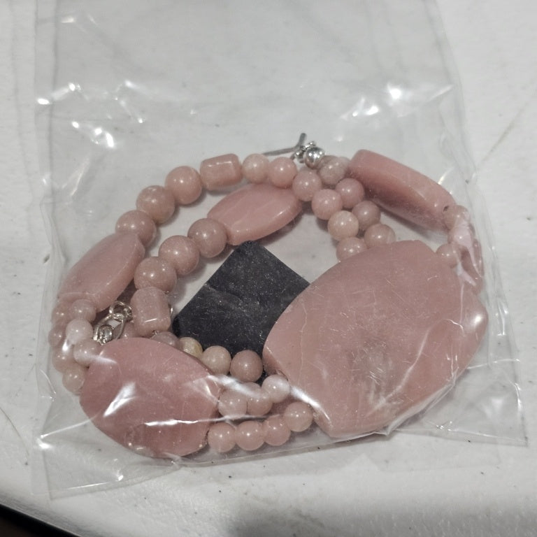 $143 Jay king strawberry quartz necklace New This exquisite Jay King strawberry quartz necklace features a stunning design with a combination of larger polished stones and delicate beading. The soft pink hues of the strawberry quartz create a serene and
