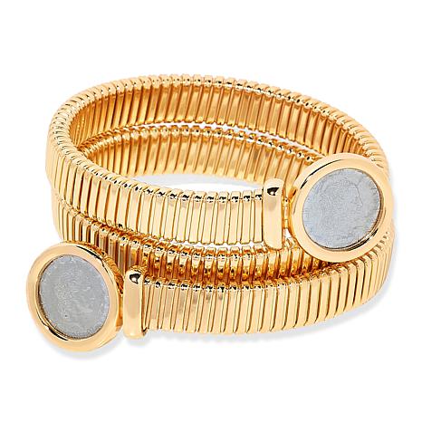$125 Bellezza coin coil bracelet New This exquisite Bellezza coin coil bracelet showcases a unique design, combining classic charm with contemporary elegance. The bracelet features a series of intricate coils, highlighted by two distinct coin elements em