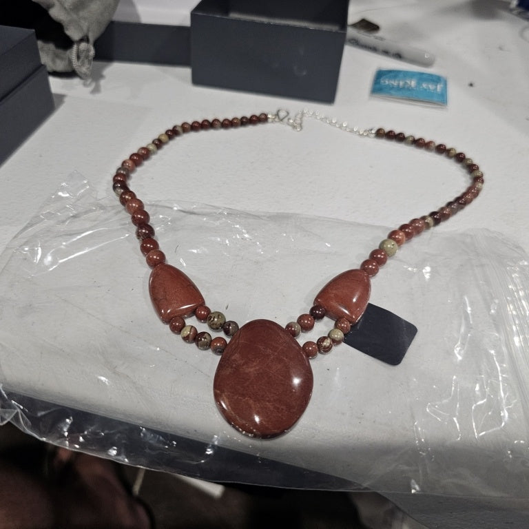 $120 Jay King Carajas Brazilian red stone necklace 888192 New This stunning necklace features exquisite Carajas Brazilian red stones artfully crafted by Jay King. The design showcases a combination of smooth, polished stones in a rich, vibrant red hue, c