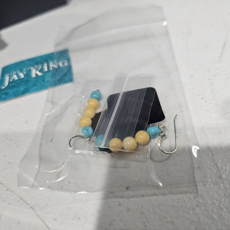 $40 Jay king mine finds turquoise and yellow calci 866687 New Experience the elegance of these Jay King Mine Finds earrings, featuring a stunning combination of turquoise and yellow calcite stones set in sterling silver. The earrings showcase a vibrant d
