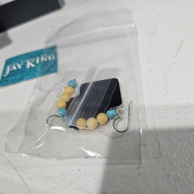 $40 Jay king mine finds turquoise and yellow calci 866687 New Experience the elegance of these Jay King Mine Finds earrings, featuring a stunning combination of turquoise and yellow calcite stones set in sterling silver. The earrings showcase a vibrant d