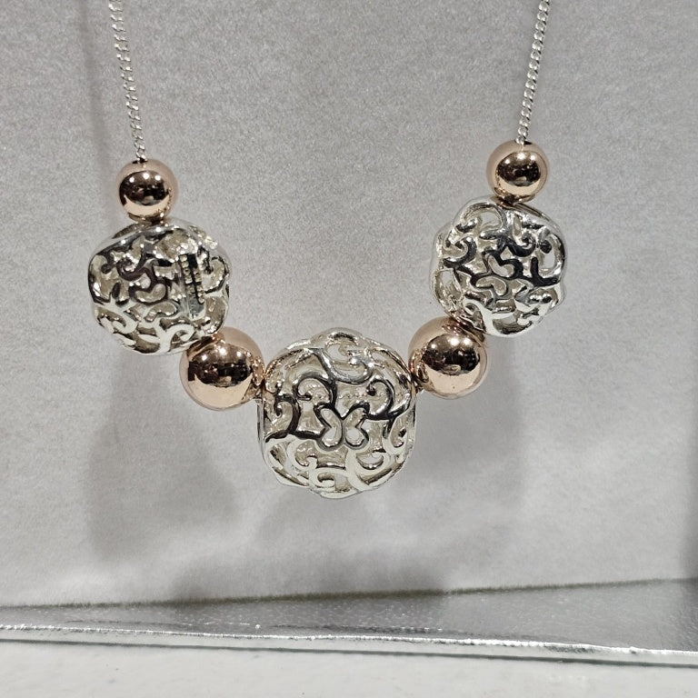 $56 Tanya Moss Elia 2-Tone Butterfly Scroll Statio New Tanya Moss Elia 2-Tone Butterfly Scroll Station Necklace Sensual scrolls swirl and whirl on the domed stations you'll find in this two-tone necklace. Each station hosts a Tanya Moss butterfly motif.
