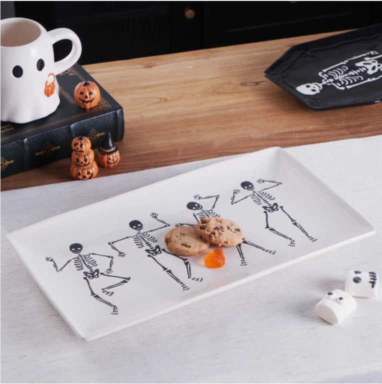 $13 Way to        Celebrate Halloween Ceramic Dancing Skeletons        Tray HARD TABLETOP this oversized    serving     tray is 14.25" x 8.19" is    dishwasher safe   has   4