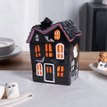 $12 Way to        Celebrate Halloween Ceramic Haunted House        Treat Jar, Food Storage HARD TABLETOP this        treat jar is a removable top ( the  roof)       features gh