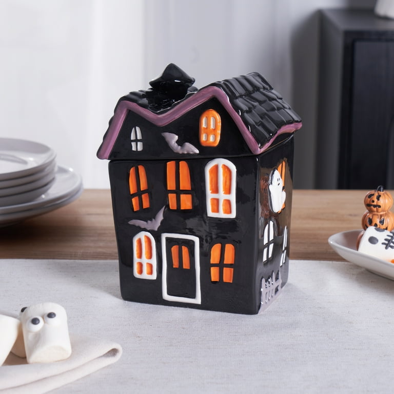$12 Way to        Celebrate Halloween Ceramic Haunted House        Treat Jar, Food Storage HARD TABLETOP this        treat jar is a removable top ( the  roof)       features gh