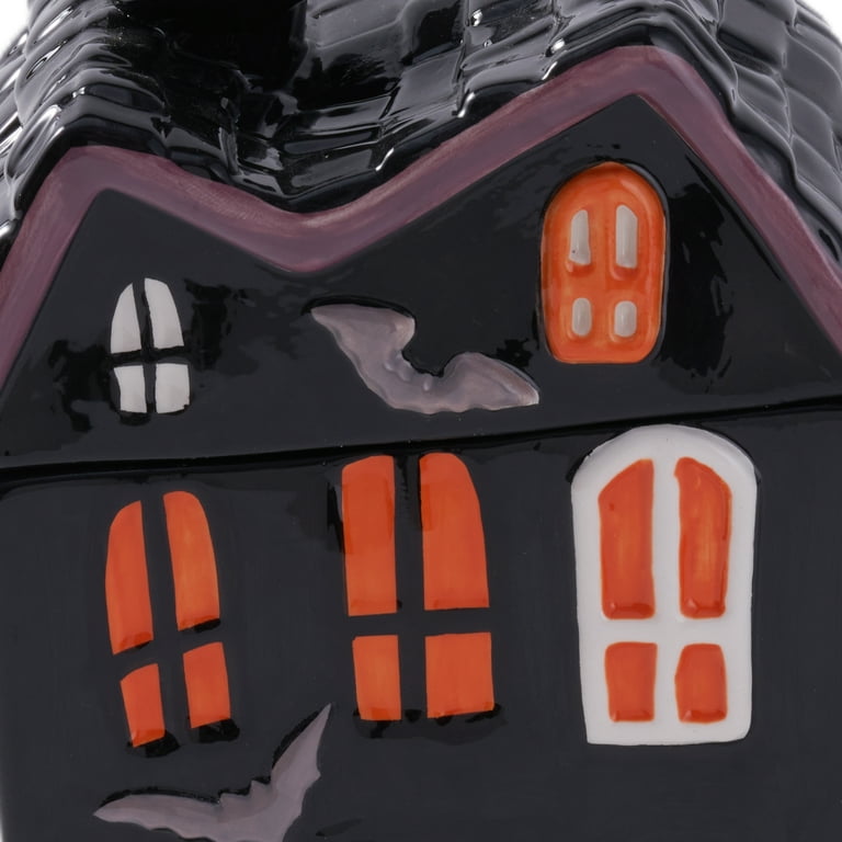 $12 Way to        Celebrate Halloween Ceramic Haunted House        Treat Jar, Food Storage HARD TABLETOP this        treat jar is a removable top ( the  roof)       features gh