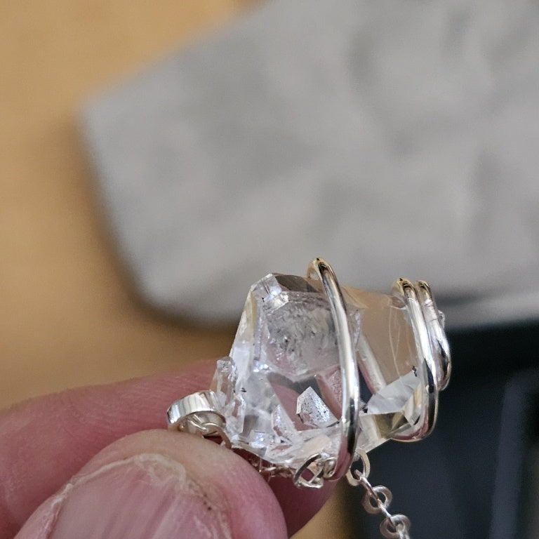 $130 double-terminated Herkimer diamond quartz cry New 878713 $130 double-terminated Herkimer diamond quartz crystal wrapped in a sterling silver cage
