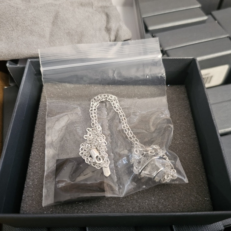 $130 double-terminated Herkimer diamond quartz cry New 878713 $130 double-terminated Herkimer diamond quartz crystal wrapped in a sterling silver cage