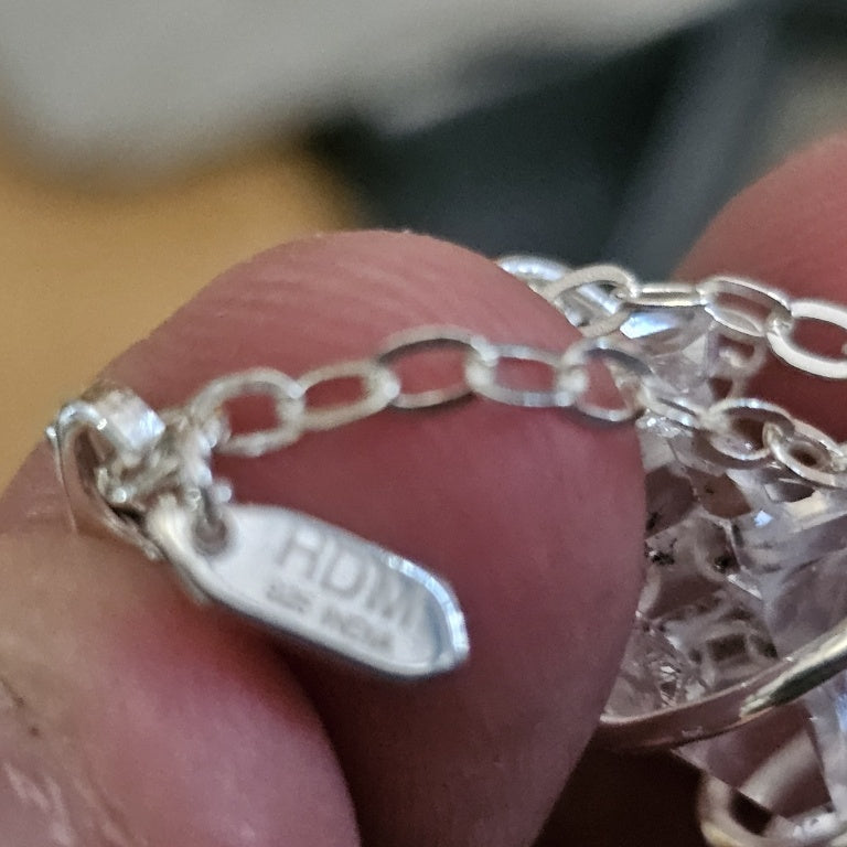 $130 double-terminated Herkimer diamond quartz cry New 878713 $130 double-terminated Herkimer diamond quartz crystal wrapped in a sterling silver cage